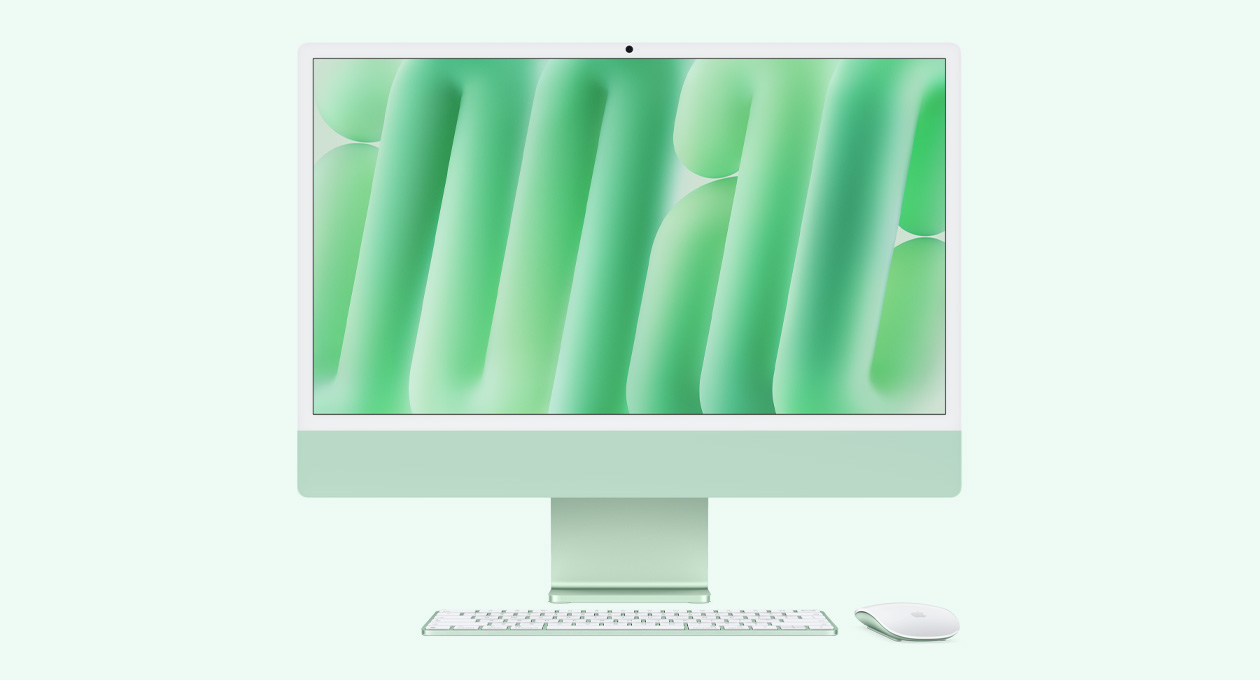 Parte da frente do iMac verde com Magic Mouse e Magic Keyboard na mesma cor