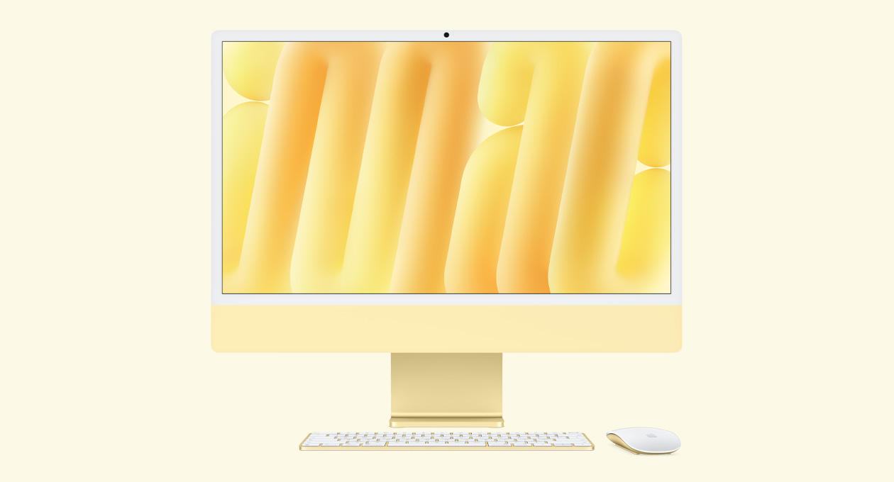 Parte da frente do iMac amarelo com Magic Mouse e Magic Keyboard na mesma cor