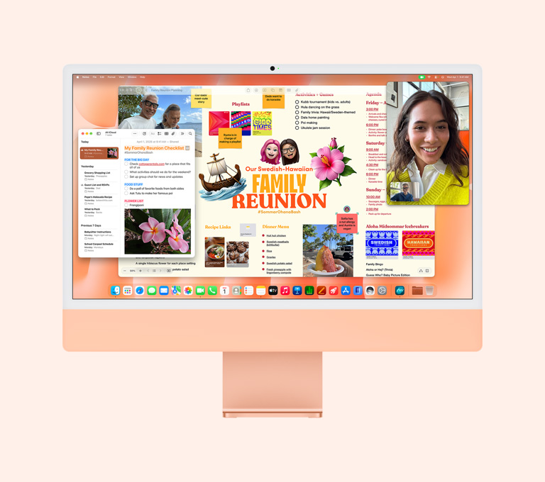Parte da frente do iMac na cor laranja. A tela mostra uma pessoa em uma chamada FaceTime, um quadro de planejamento de uma reunião familiar e o app Notas