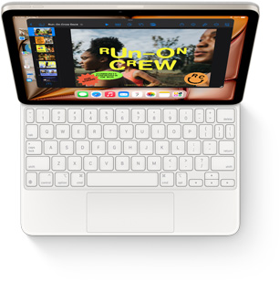 Vista de cima do iPad Air com Magic Keyboard branco.