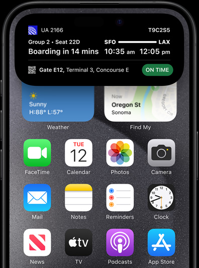 iPhone 15 Pro with Dynamic Island showing live sports scores