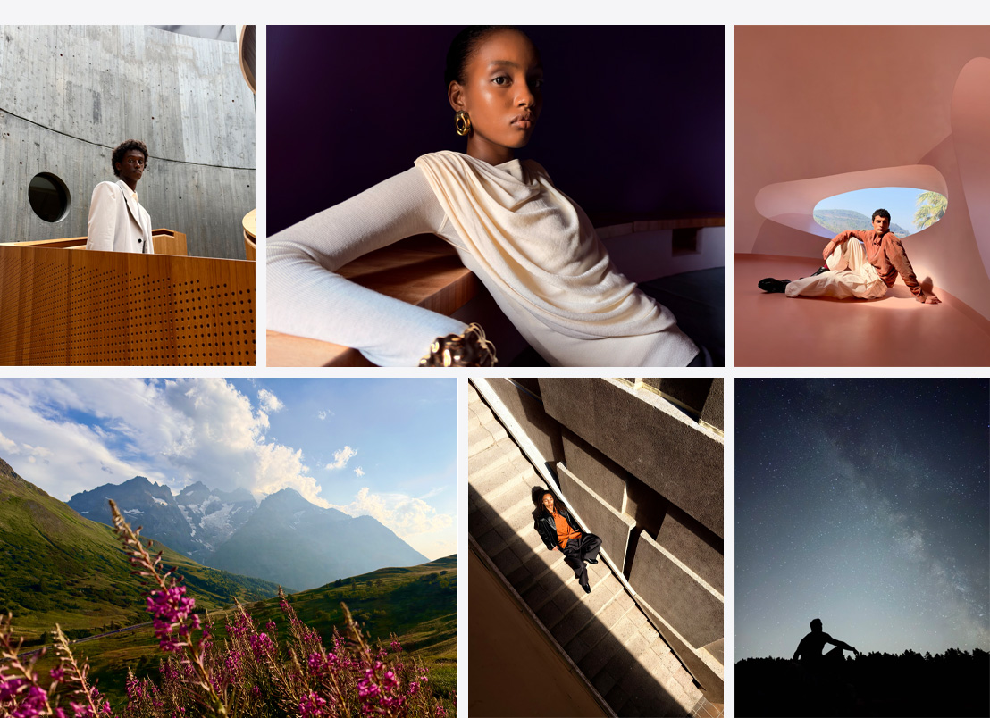 Series of iPhone photos, a person in a white jacket standing against a concrete wall, a close-up of a woman leaning against a table with a shadow-filled room in the background, wide-angle shot of a person posing against a modern, colourful, architectural background, wide-angle shot of grassy mountains with purple flowers in the foreground, a woman posing on a set of stairs with the sun shining on her, a wide-angle shot of a starry night sky
