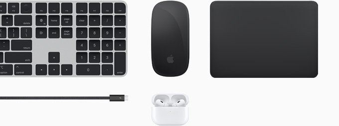 Collection d’accessoires incluant un Magic Keyboard, une Magic Mouse, un Magic Trackpad, un câble Thunderbolt 4 Pro et des AirPods Pro.