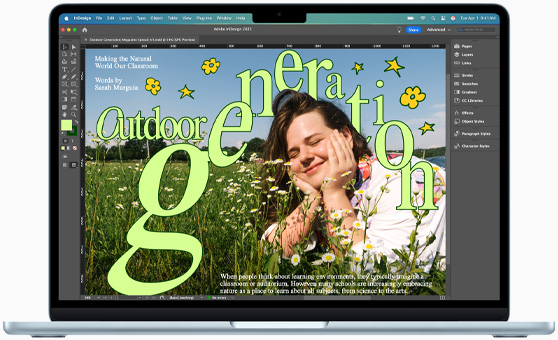 MacBook Air, der viser et Adobe InDesign-projekt