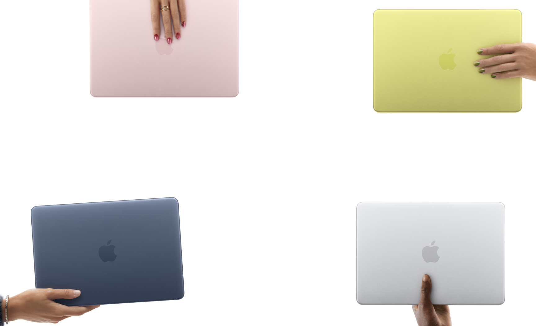 MacBook Neo laptops in various colours, each held in a different person's hand