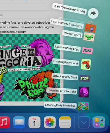 Grande plano da Dock na parte inferior do ecrã, com uma série de ficheiros a expandirem verticalmente a partir da Dock