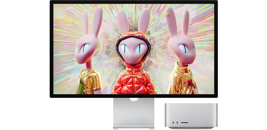 Mac Studio se Studio Displayem zobrazujícím 3D animaci s králičími postavičkami.