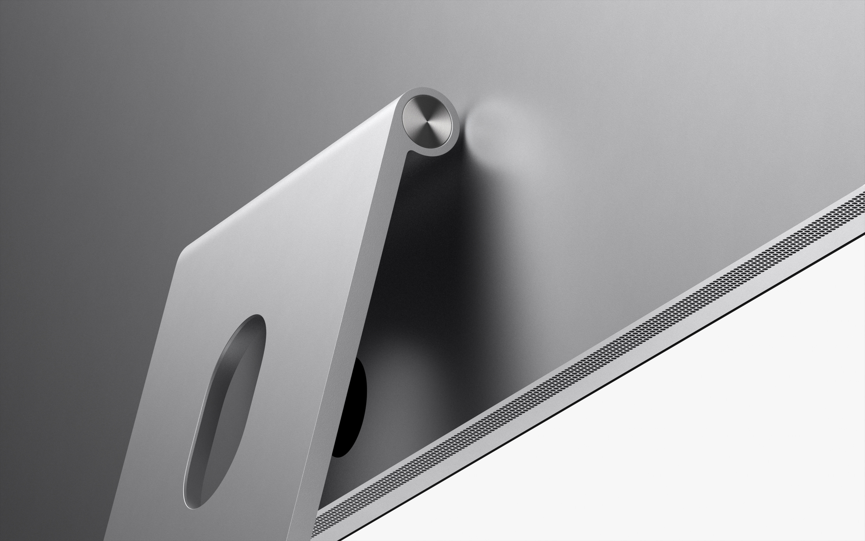 기울기 조절 스탠드에 장착된 Studio Display를 뒤에서 바라본 모습